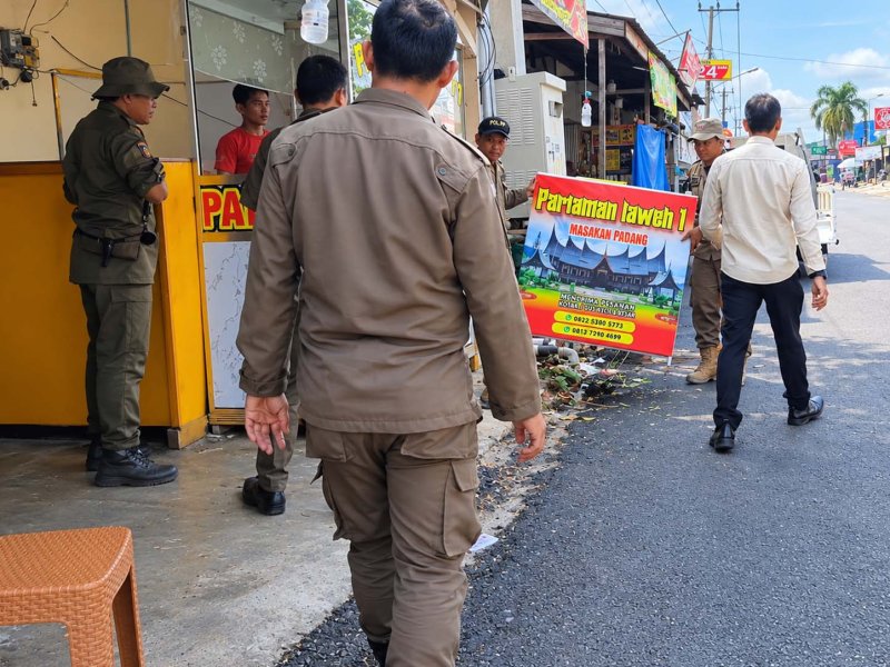 Satpol PP Banjar Tindaklanjuti Laporan Masyarakat melalui Aplikasi SIAP di Kawasan Sekumpul